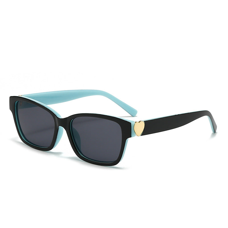 Damen modische quadratische Sonnenbrille mit Herz-Akzenten Karnz