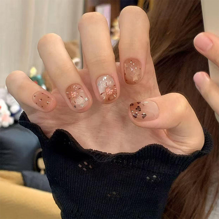 Kunstnagelset mit eleganten Glitzer-Akzenten Karnz