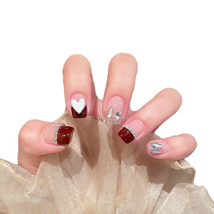 Künstlerisches Press-On Nagelkunst Set mit Herz- und Sterndesigns