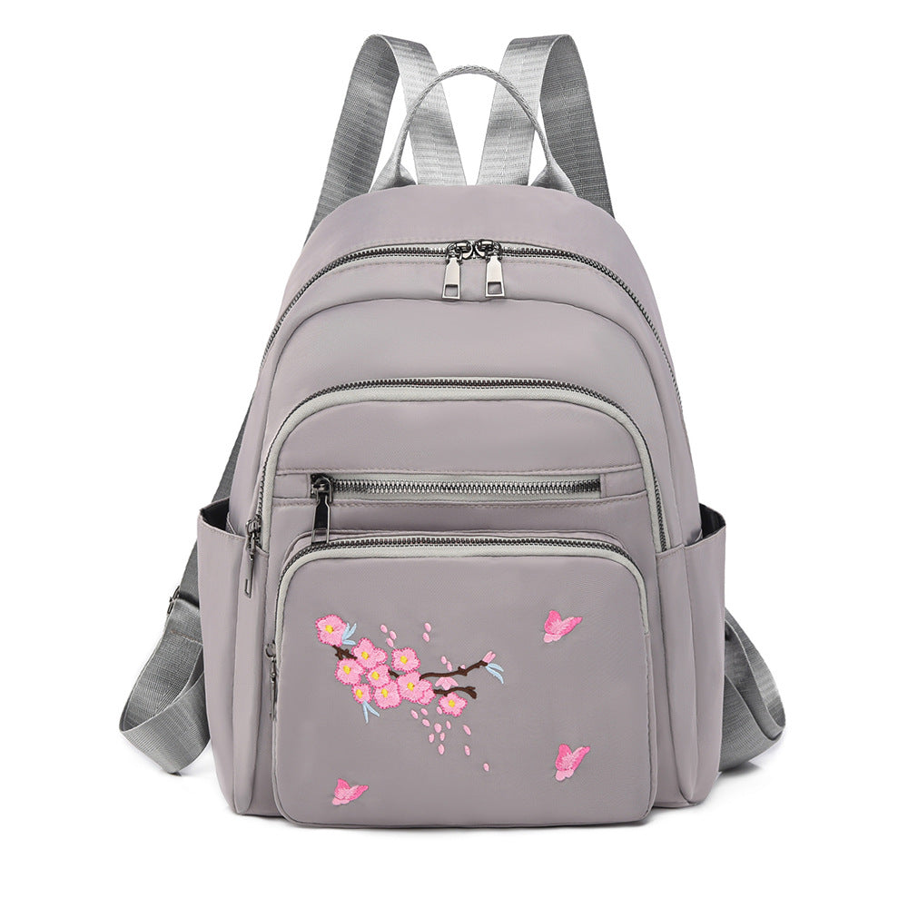 Elegante bestickte Mini-Rucksack
