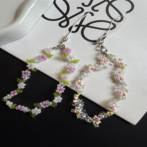 Perlenbesetzte Blumenschmuckkette Karnz
