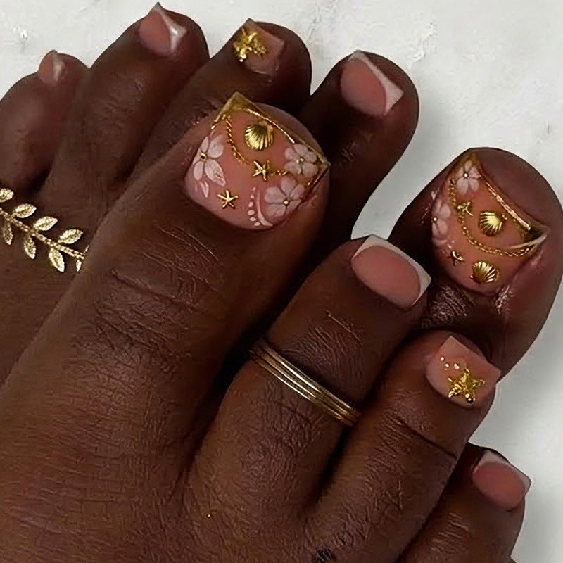 Floral Design Press-On Nagelset mit goldenen Akzenten Karnz
