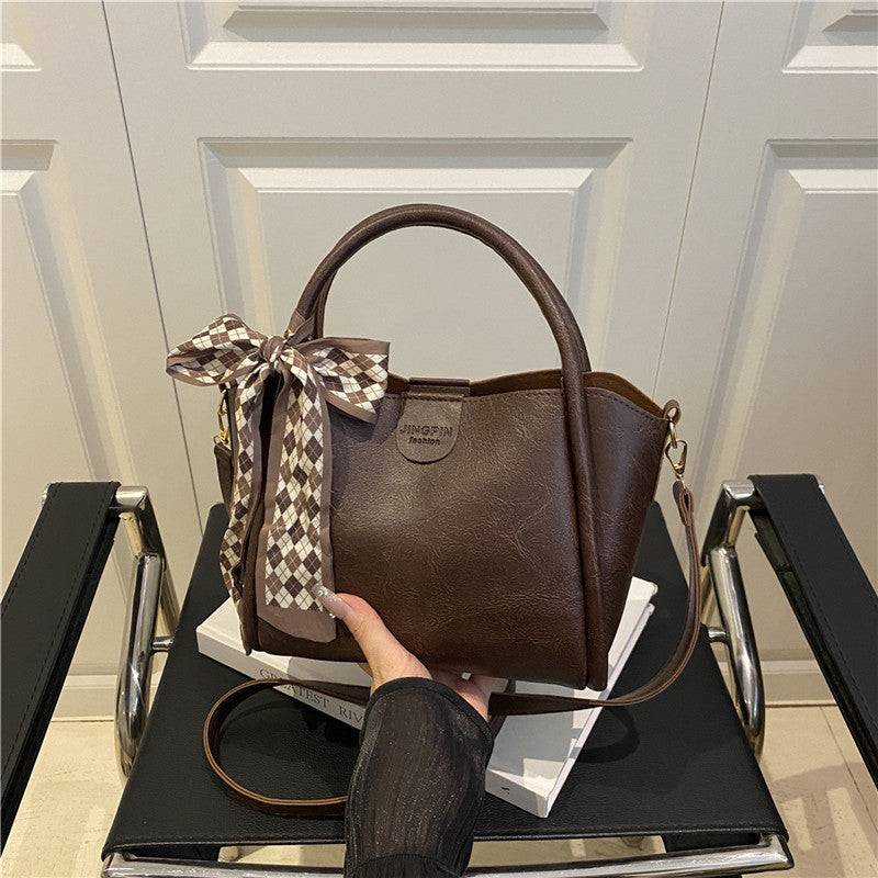 Elegante Schleifenakzent-Handtasche Karnz