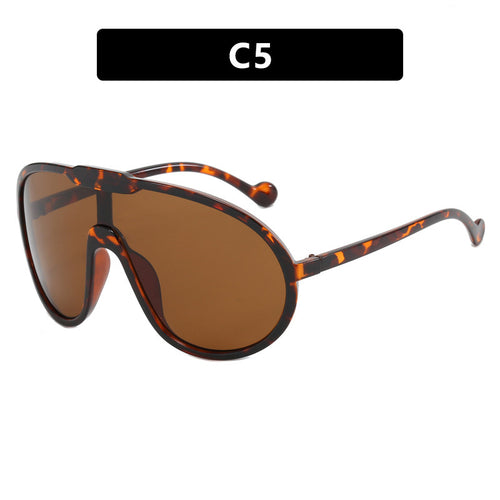Damen Sportliche Sonnenbrille mit breitem Rahmen und gelben Gläsern Karnz
