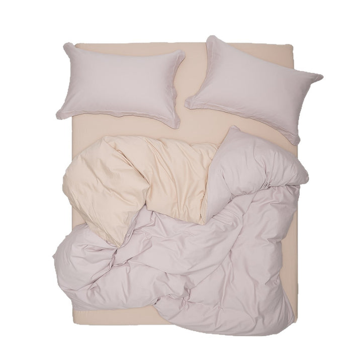 Minimalist gewaschenes gebürstetes Baumwoll-Bettwäsche-Set mit tiefem Spannbetttuch und Kissenbezügen
