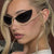 Damen extravagant geformte Cat-Eye Sonnenbrille mit funkelnden Applikationen Karnz