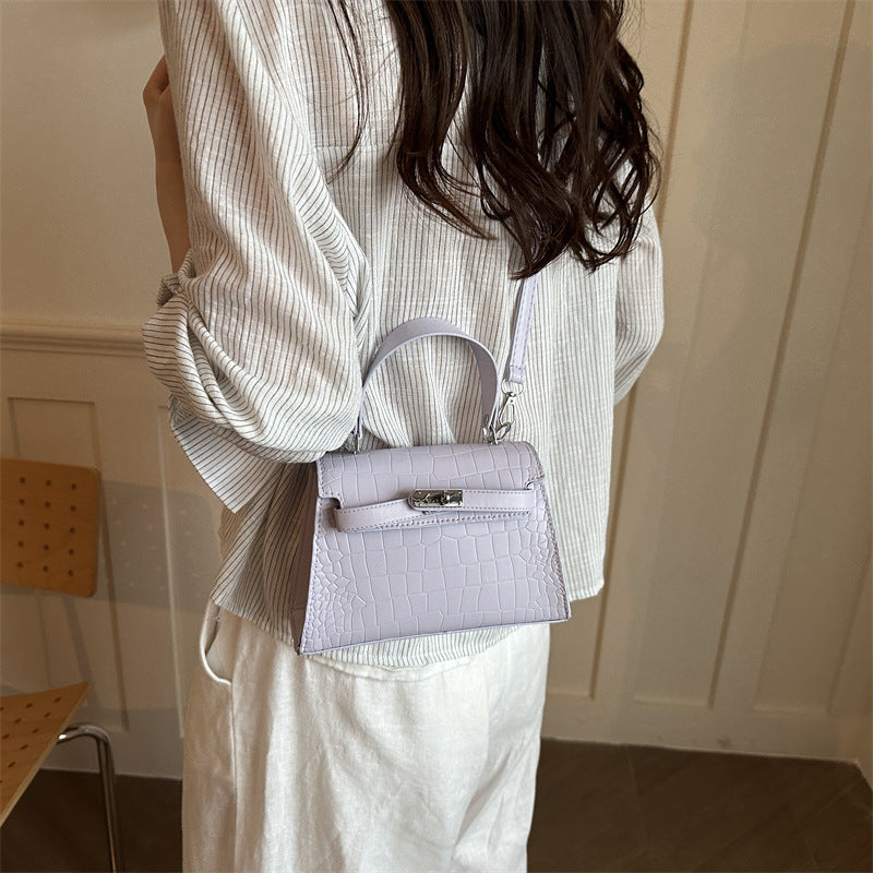 Elegante krokodilgeprägte Handtasche