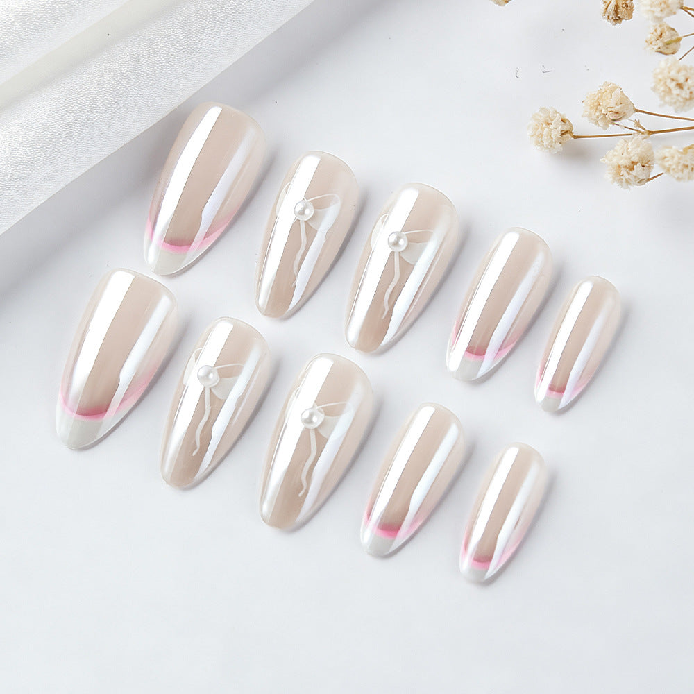 Elegante French Tip Press-On Nägel mit Schleifenakzenten Karnz