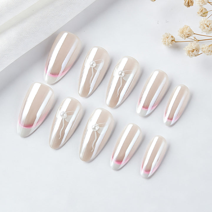 Elegante French Tip Press-On Nägel mit Schleifenakzenten Karnz