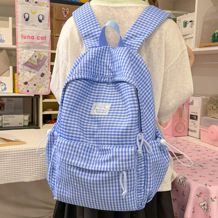 Stylischer gittergemusterter Tagesrucksack Karnz