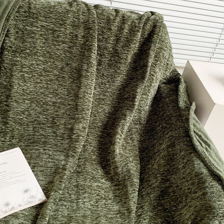 Gemütliche Strickwurfdecke
