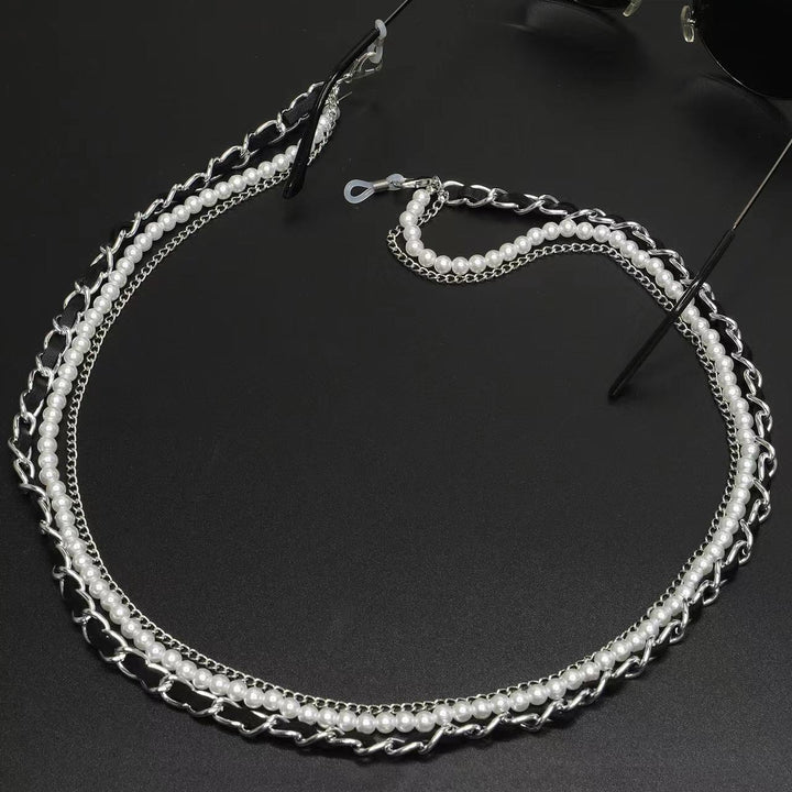 Dekorativer Brillenband mit Perlen Karnz