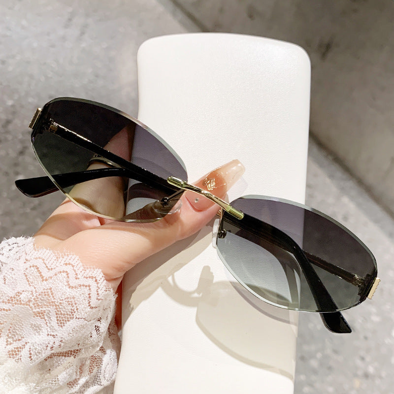 Damen Sonnenbrille im modernen Ovaldesign mit kontrastierendem Rahmen Karnz