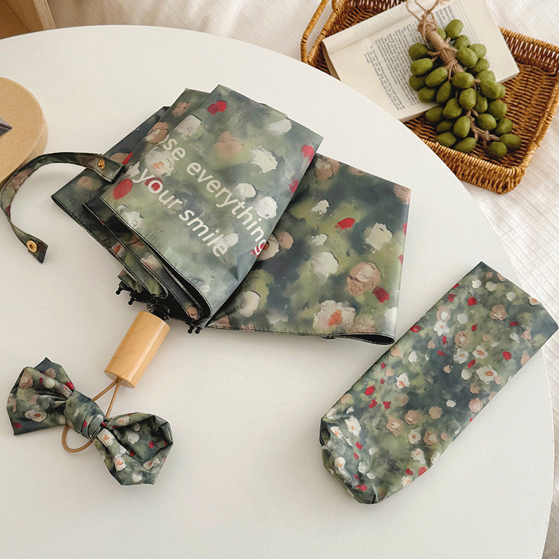 Damen Faltbarer Regenschirm mit floralem Design Karnz