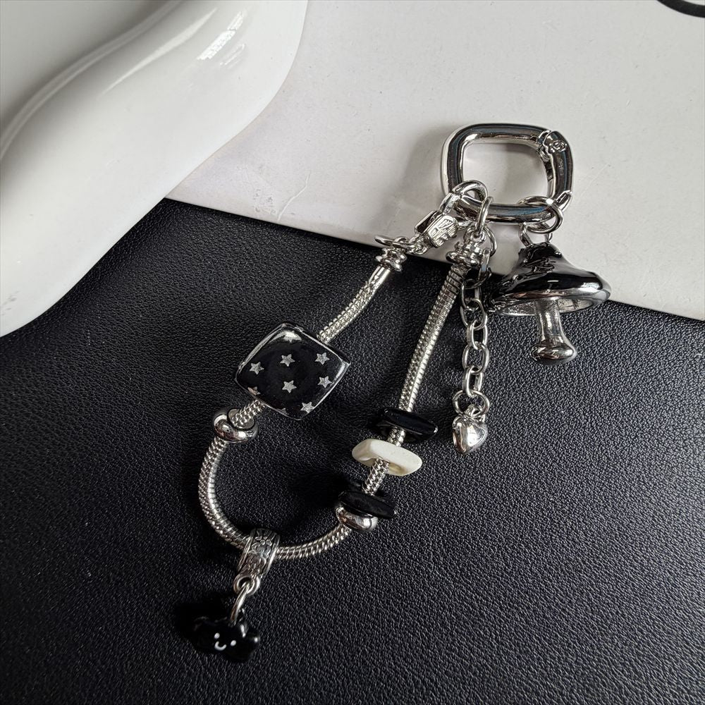 Dekorativer Charm Schlüsselanhänger Karnz 1790134835