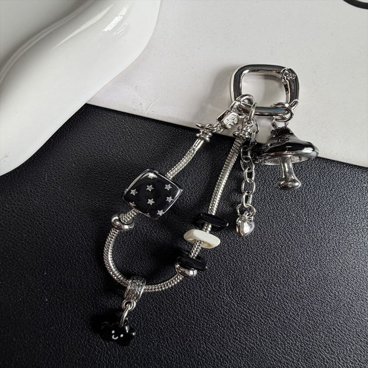 Dekorativer Charm Schlüsselanhänger Karnz 1790134835
