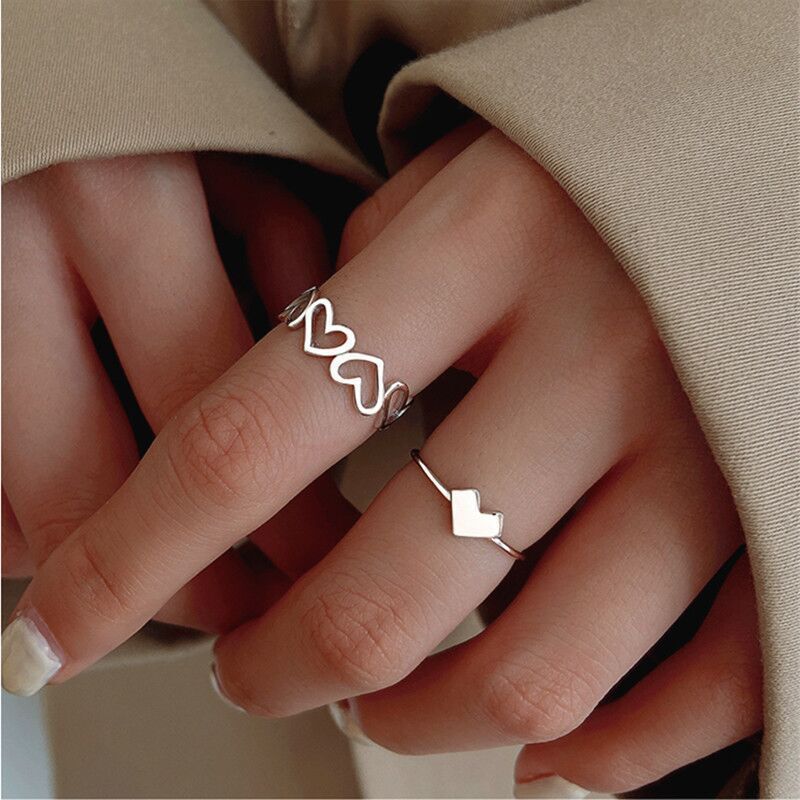 Elegante Herz- und Wellen Design Ring Karnz