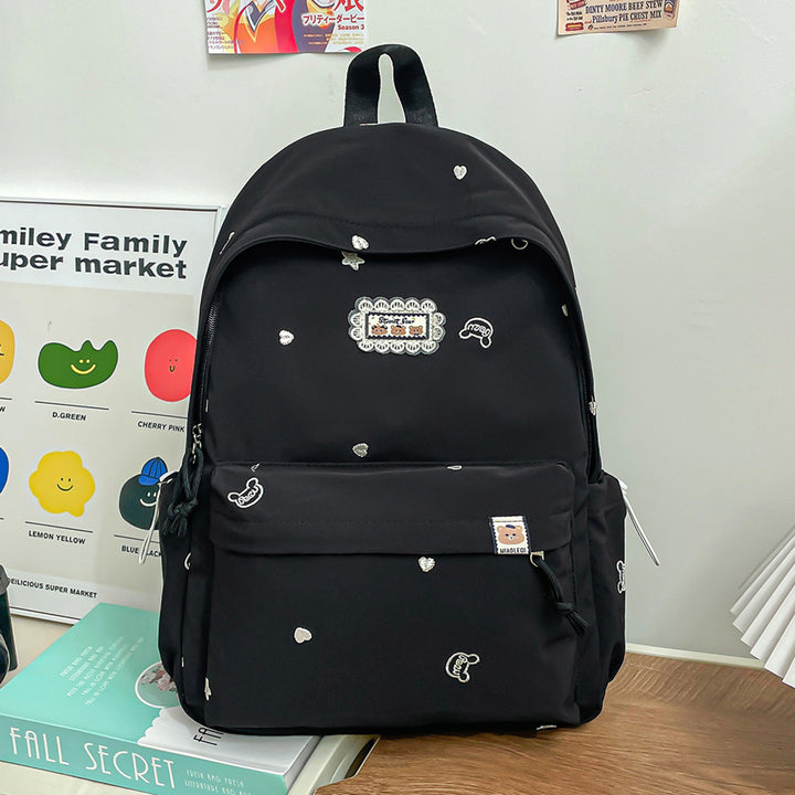 Stylischer backpack mit floralem Schmuck Karnz