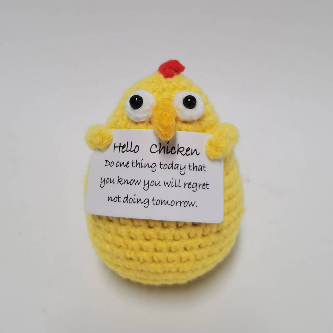 Plüschknuffel mit Weihnachtsmannhut und Schal