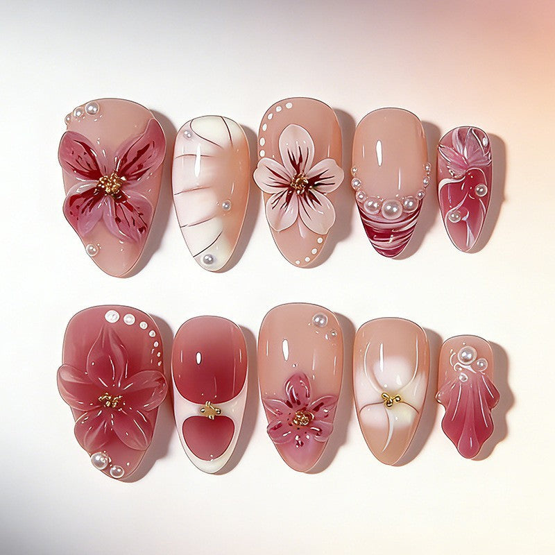kreatives Kunstnagelset mit maritimen Motiven und funkelnden Akzenten Karnz
