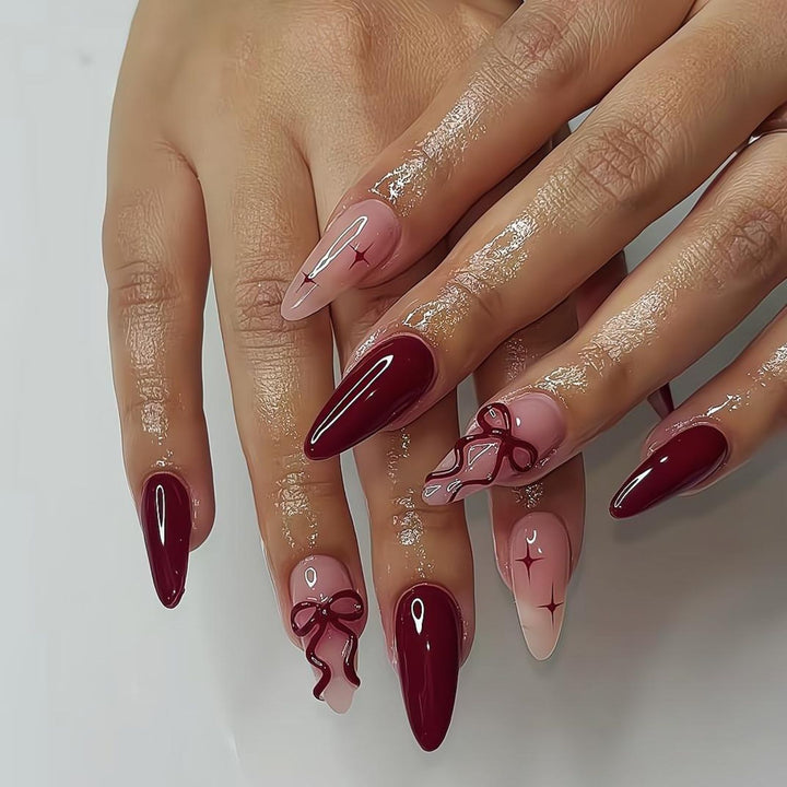 Kunstnagelset mit eleganten Schleifen- und Glitzer-Designs Karnz