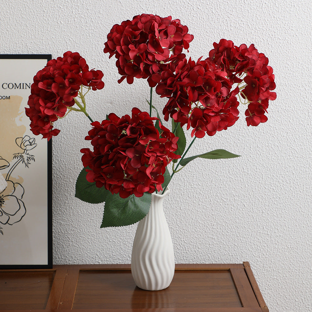 Dekorative Kunstblumenarrangement Karnz