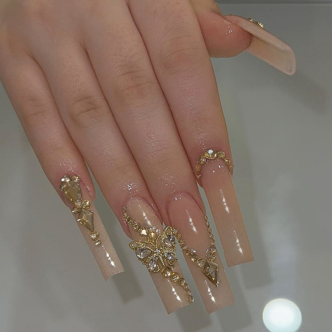 Dekoratives Press-On-Nagelset mit Strassverzierungen Karnz