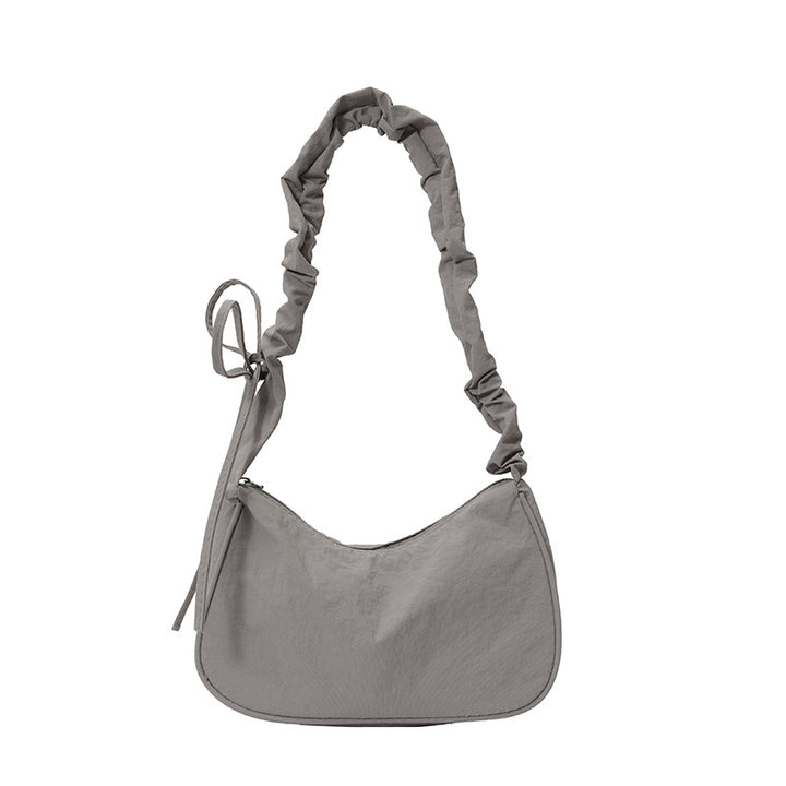 WoTexturiertes Stoff Sling Bag Karnz