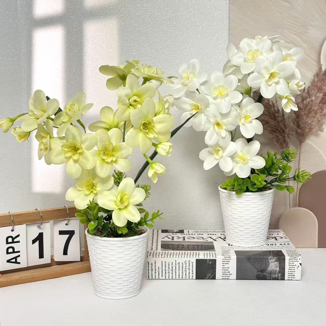 Künstliche Orchideenpflanzenanordnung für die Innendekoration zuhause