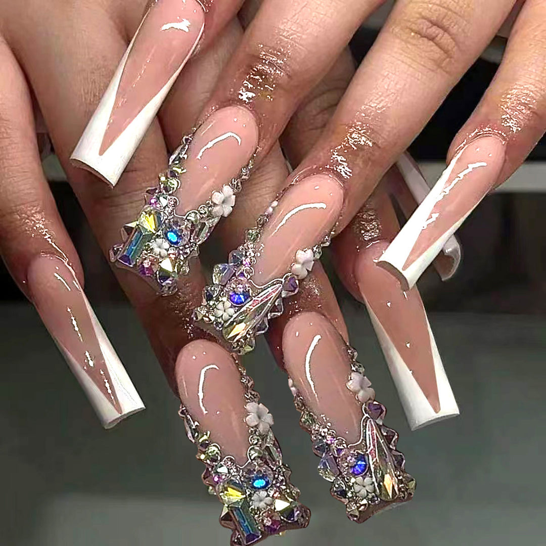 Luxus Stiletto Press-On Nägel mit floralen Verzierungen Karnz