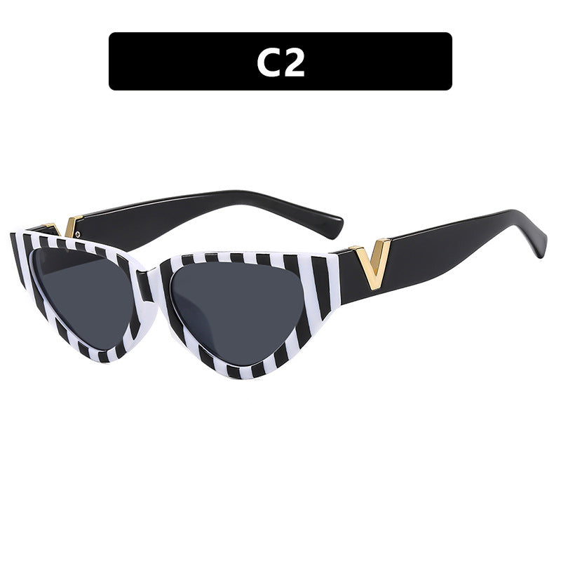 Damen Cat-Eye Sonnenbrille mit stylishem Zebra-Design und luxuriösen Akzenten Karnz