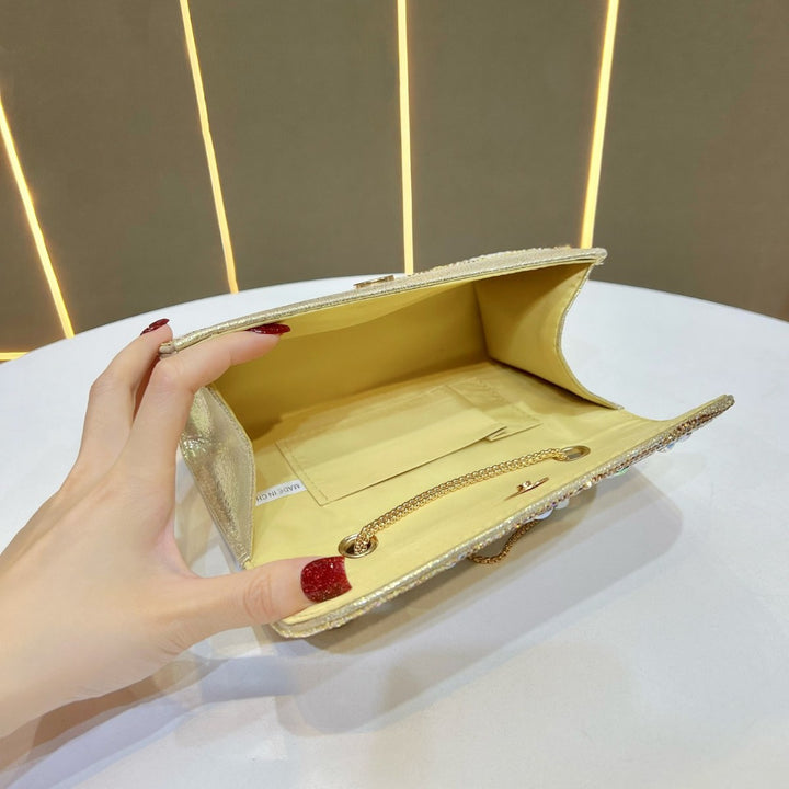 Elegante, mit Kristallen verzierte Abend-Clutch