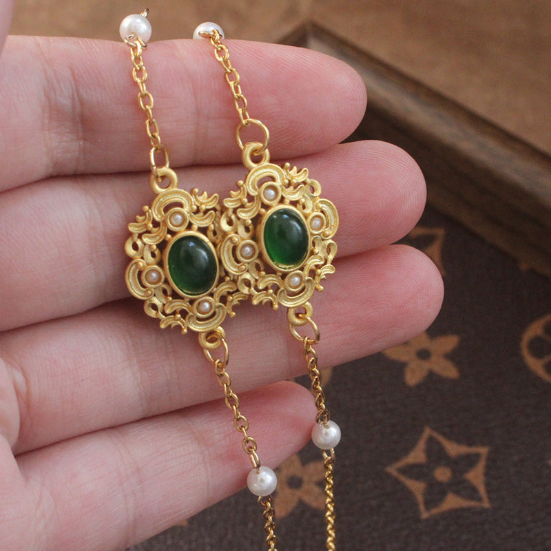 Elegante Schmuckhalterkette mit Perlen und Grüner Steindekoration Karnz