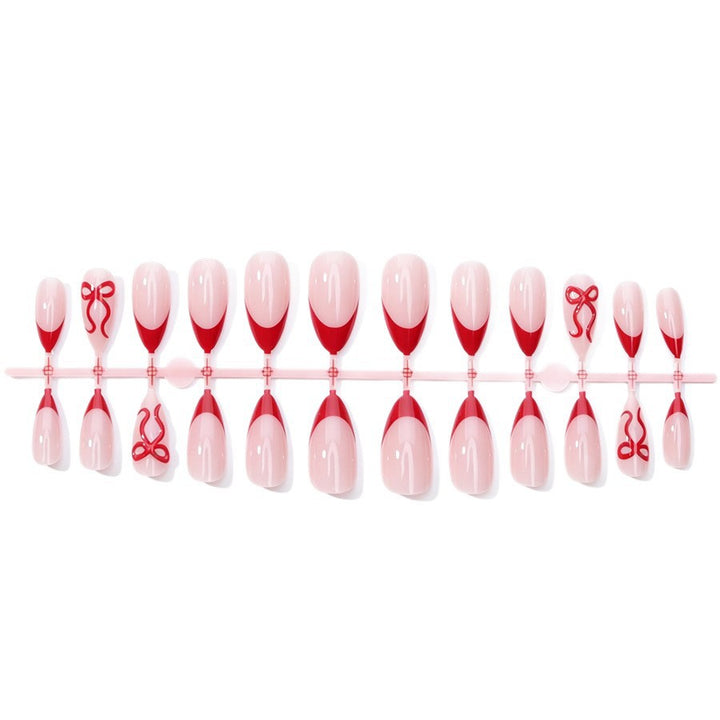 Kunstnagelset mit elegantem Motiv und Glitzerakzenten Karnz