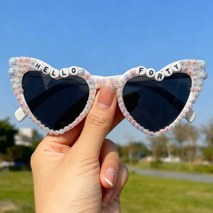 Perlenverzierte Cat-Eye-Sonnenbrille Karnz