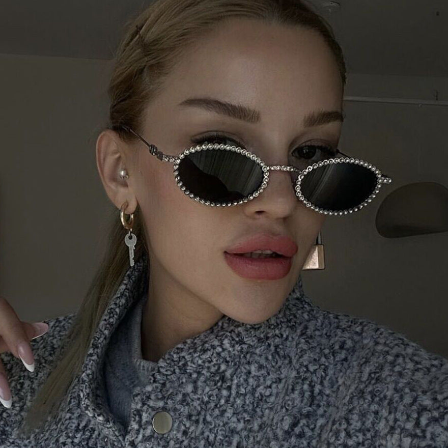 Damen extravagante Sonnenbrille mit originellem Rahmen und modernen Gläsern Karnz