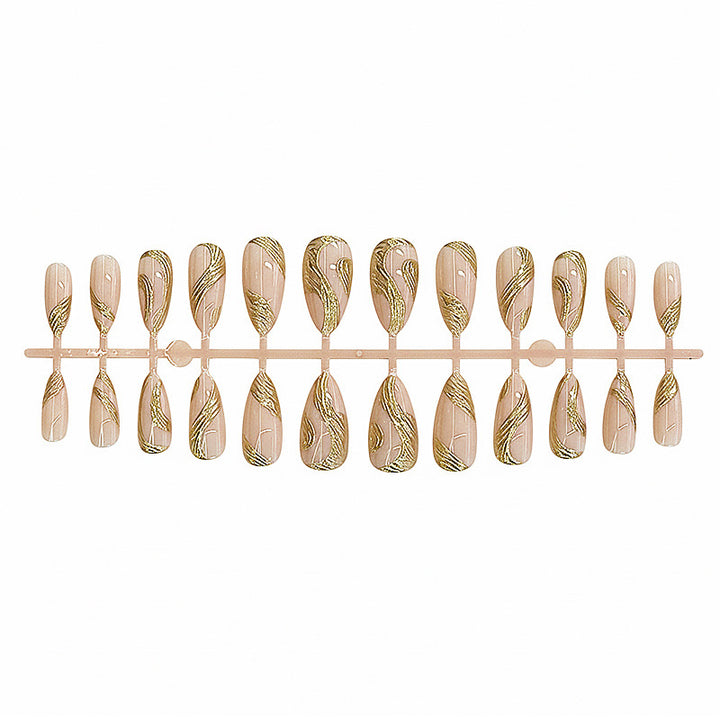 Künstlerisches Press-On Nagelset mit goldener Wirbel-Design Karnz