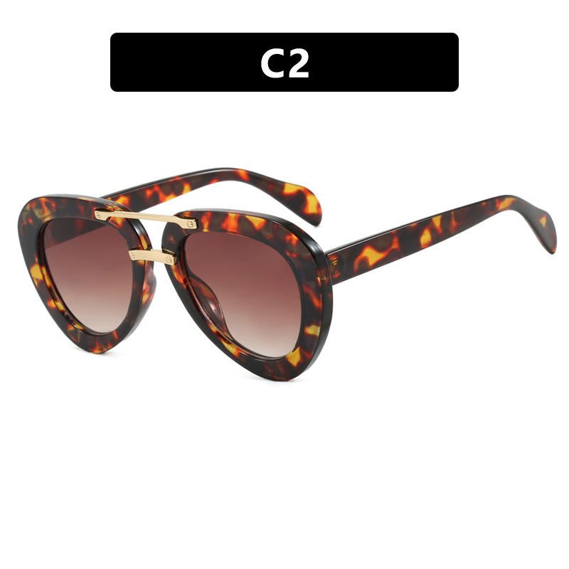 Damen extravagante Sonnenbrille im modernen Herzdesign Karnz