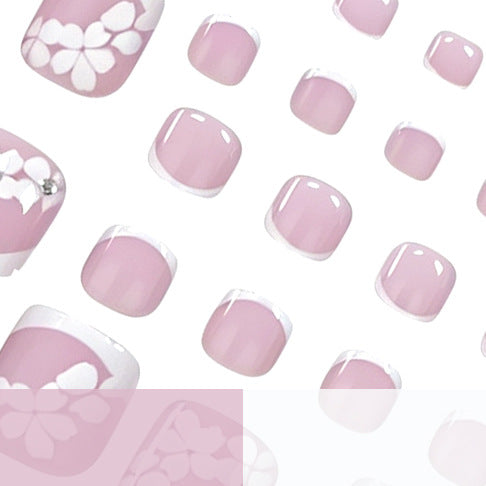 Elegante florale French Tip Pediküre Karnz