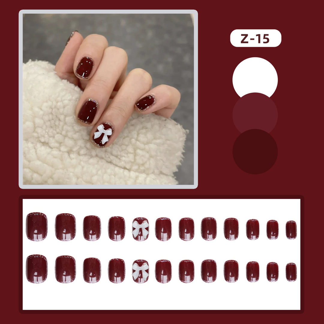 Künstlerisches Press-on-Nagelset mit Schleifen-Design