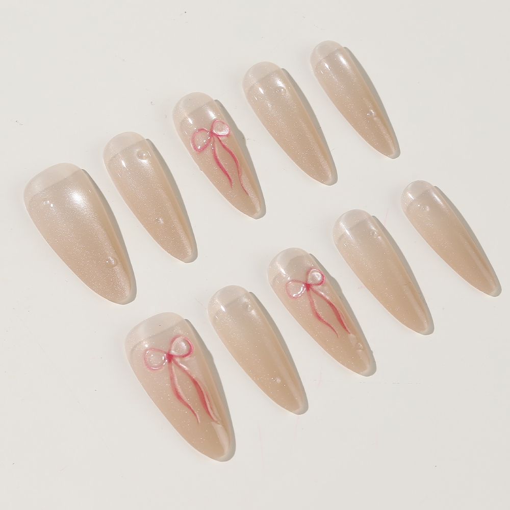 Elegantes Stiletto Press-On Nagelset mit Schleifenakzenten Karnz