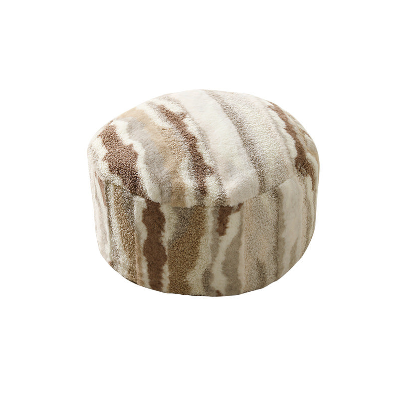 Rundes Sitzpouf aus Teddy‑Fleece mit weichem Strukturbezug