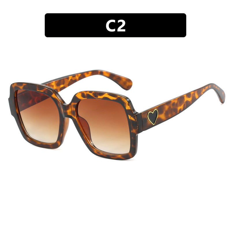 Damen quadratische Sonnenbrille mit modischem Herzakzent Karnz