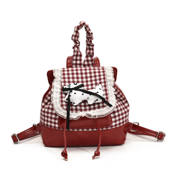Verspielter Rucksack mit Karomuster und Tierapplikation Karnz