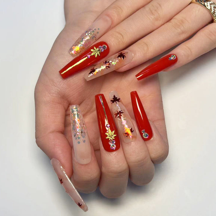 Kunstvolle Nagelverlängerungen mit Herbstmotiven Karnz