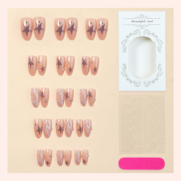 Künstlerisches Press-On Nail Set mit Stern- und Perlenakzenten Karnz