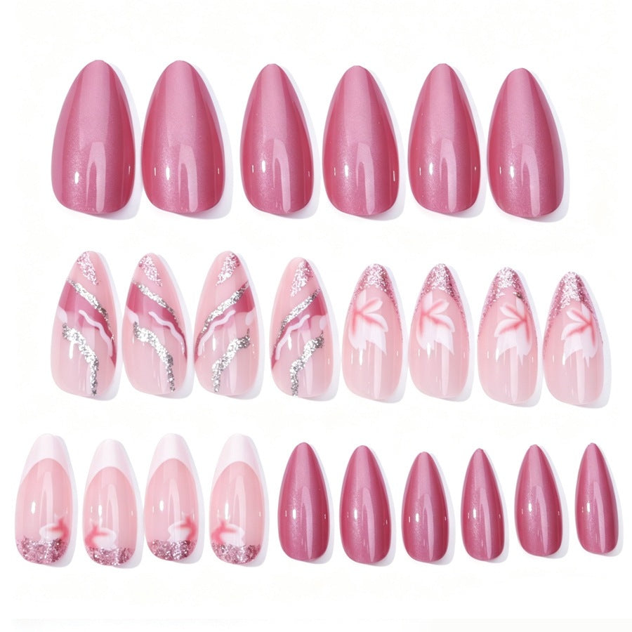 Kunstnagelset mit floralen Mustern und Glitzerelementen Karnz