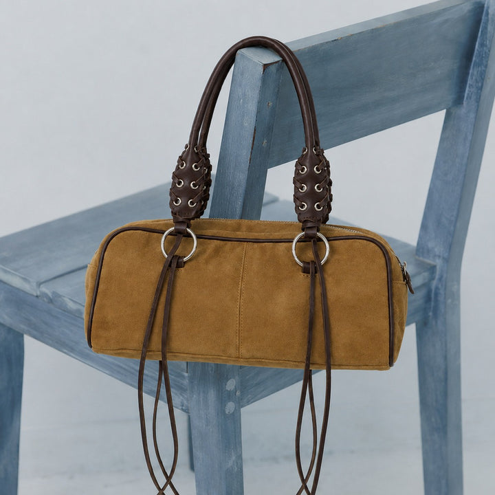 Luxuriöse Lederhandtasche mit geflochtenen Trägern
