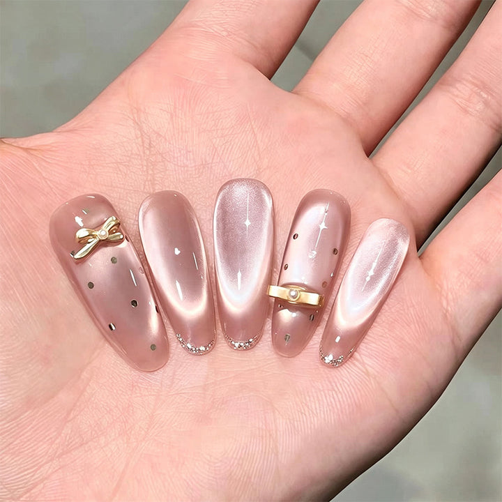 Kunstnagelset mit eleganten Glitzer-Akzenten Karnz