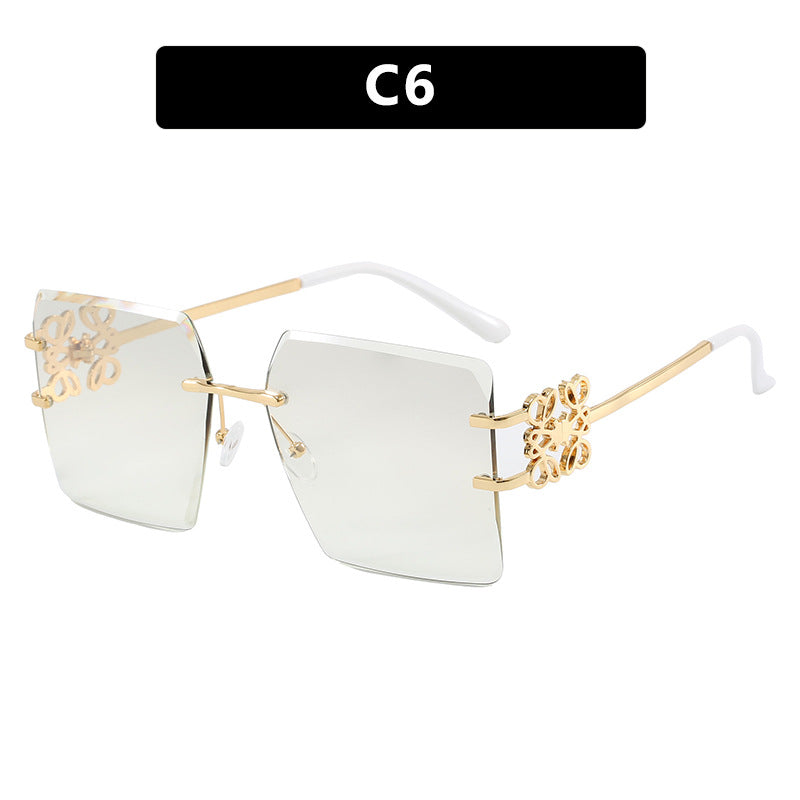 Damen modische Sonnenbrille mit außergewöhnlichem Design und goldenen Akzenten Karnz